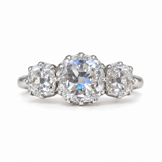5 TCW old mine cushion moissanite three stone engagement ring with claw prongs in white gold