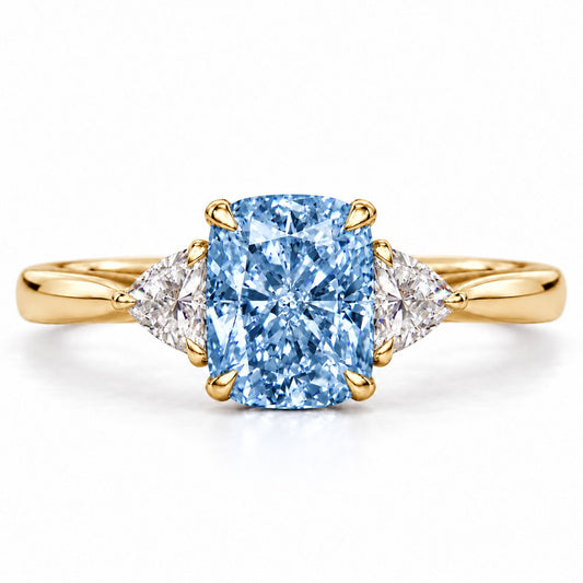 Blue Elongated Cushion Cut Lab Grown Diamond Engagement Ring - Trillion Three Stone in yellow gold, front view