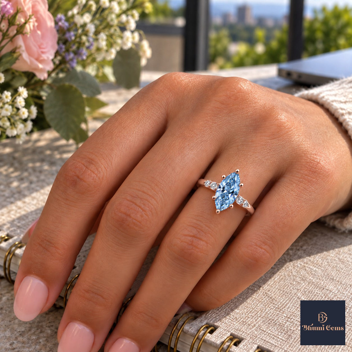 Blue Marquise Cut Lab Grown Diamond Engagement Ring - Round Accents in rose gold, worn on the hand