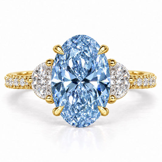 Blue Oval Cut Lab Grown Diamond Engagement Ring - Half Moon Pave in yellow gold, front view