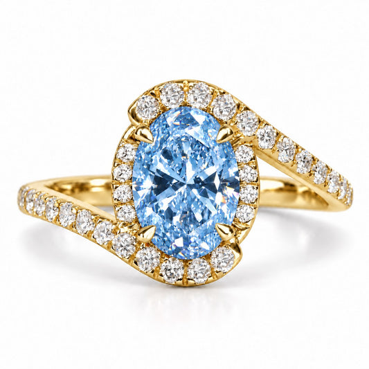 Blue Oval Cut Lab Grown Diamond Engagement Ring - Halo Bypass in yellow gold, front view
