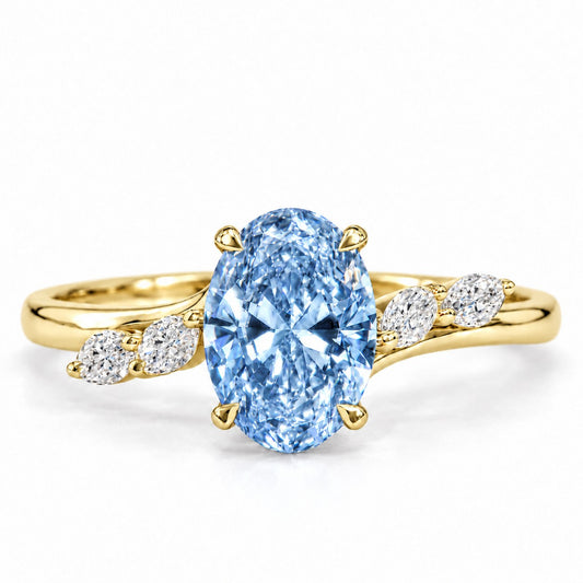 Blue Oval Cut Lab Grown Diamond Engagement Ring - Leaf Bypass in yellow gold, front view