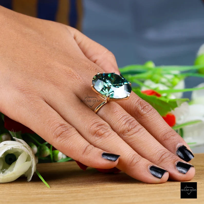 gold round brilliant moissanite ring