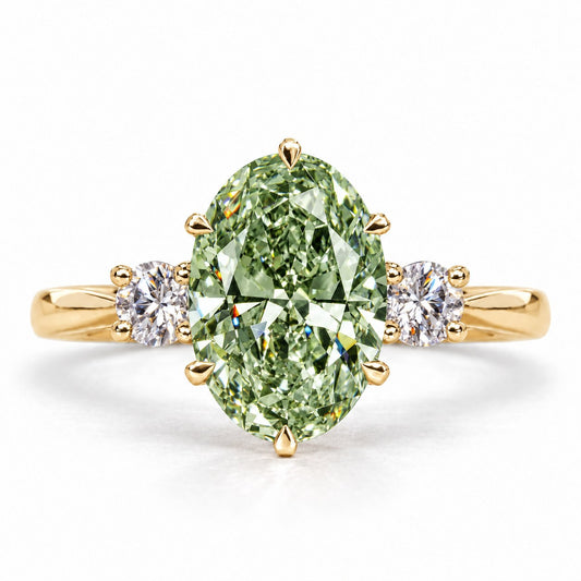Green Oval Cut Lab Grown Diamond Engagement Ring - Three Stone in yellow gold, front view