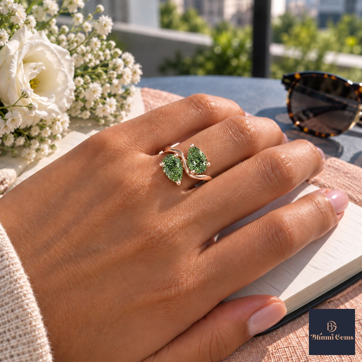 Green Pear Cut Lab Grown Diamond Engagement Ring - Toi et Moi in rose gold, worn on the hand