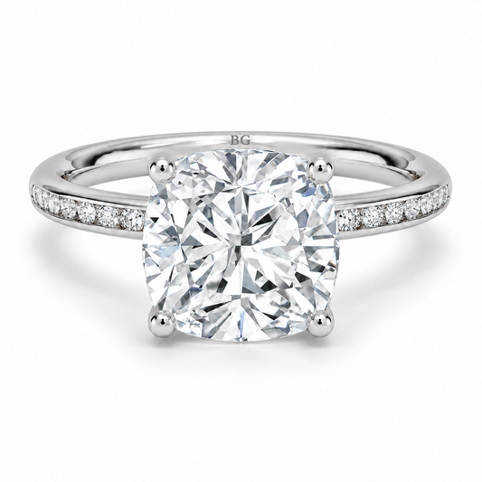 Cushion cut lab grown diamond solitaire ring with channel set band in white gold