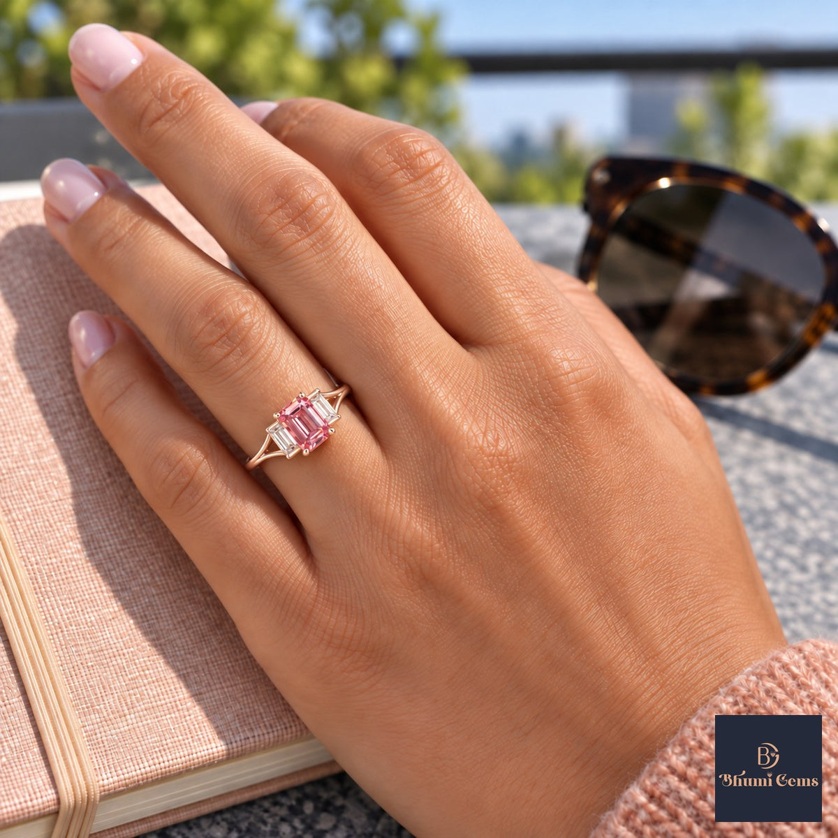 Pink Emerald Cut Lab Grown Diamond Engagement Ring - Trapezoid Three Stone in rose gold, worn on the hand