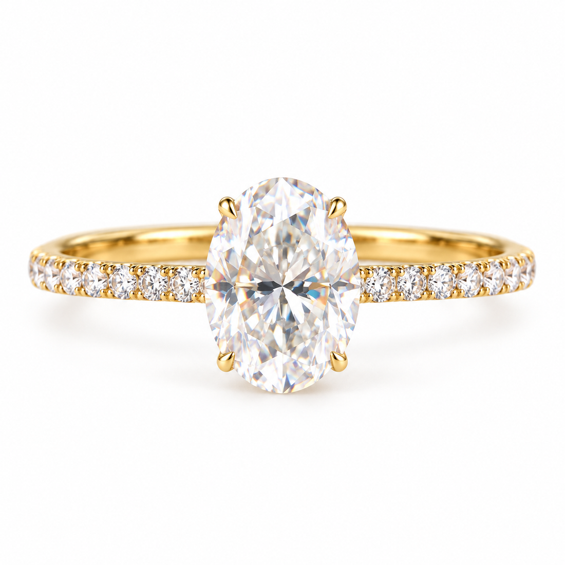 2 ct oval moissanite engagement ring with a pave band in yellow gold