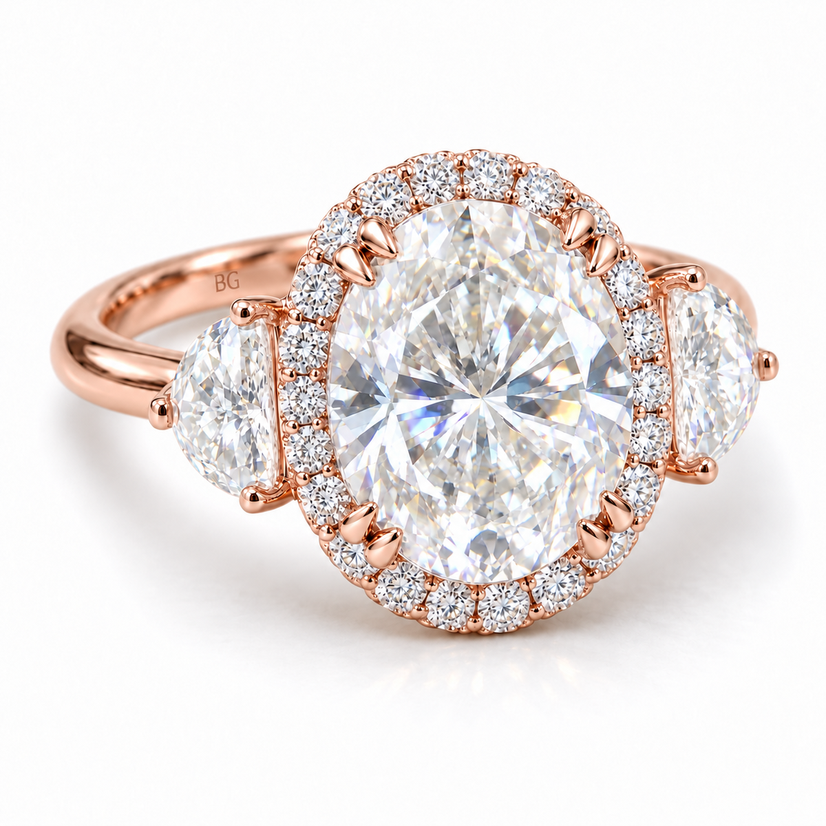 Oval moissanite halo engagement ring with half-moon side stones in rose gold