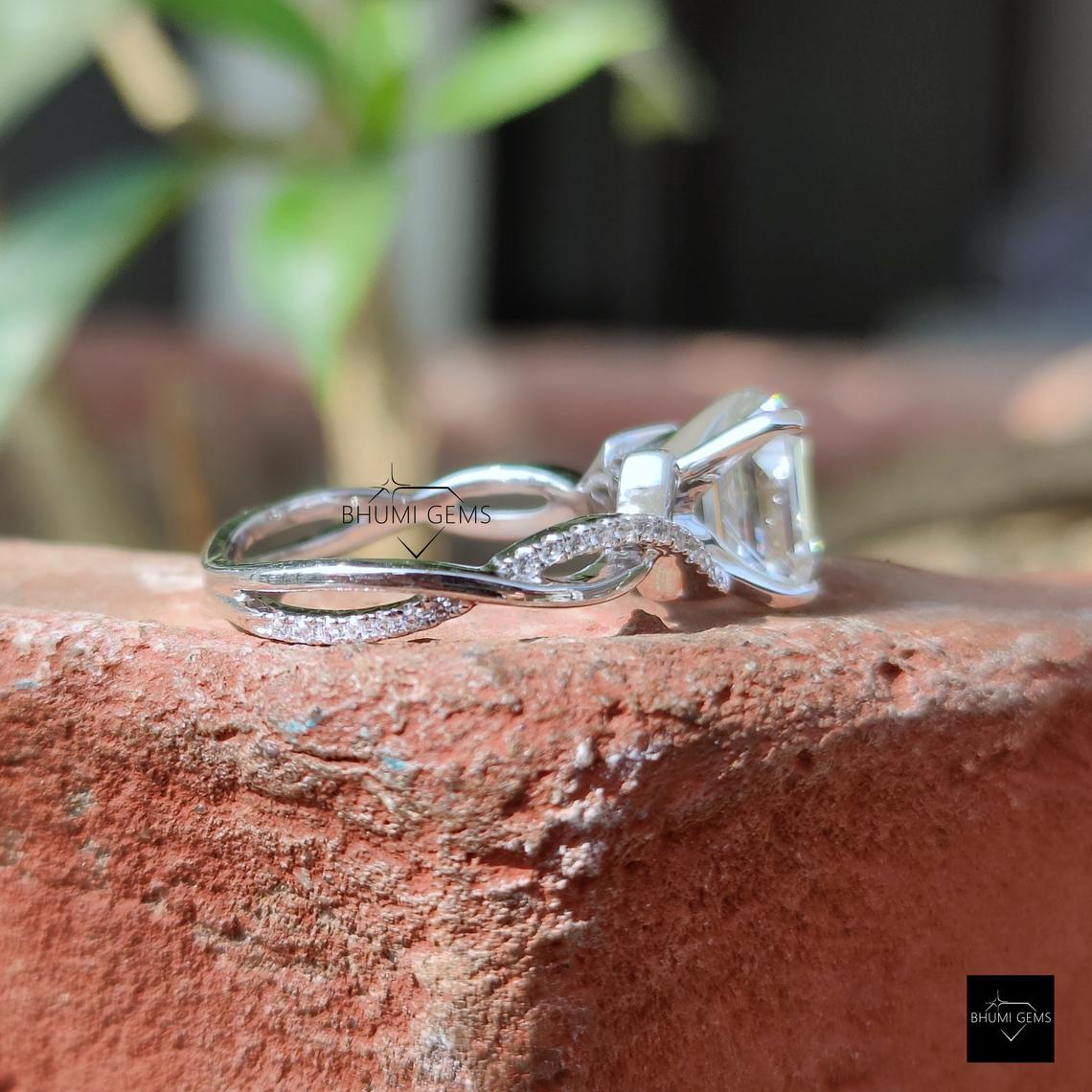 2.38 TCW Emerald Cut Moissanite Infinity Engagement Ring - view 5