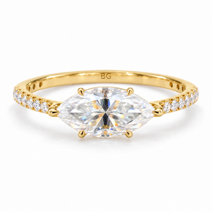 2.04 TCW east-west marquise moissanite claw prong ring with pave band in yellow gold