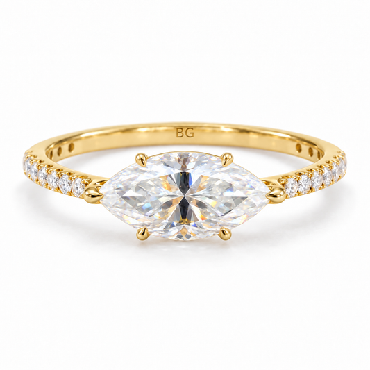 2.04 TCW east-west marquise moissanite claw prong ring with pave band in yellow gold