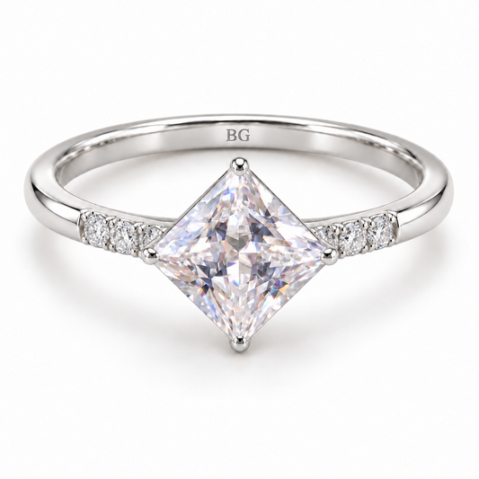 Princess cut moissanite kite set engagement ring with accented shoulders in white gold