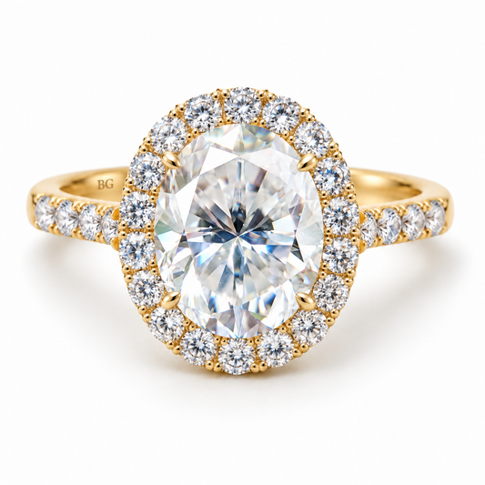 Oval halo moissanite engagement ring with pave band in yellow gold