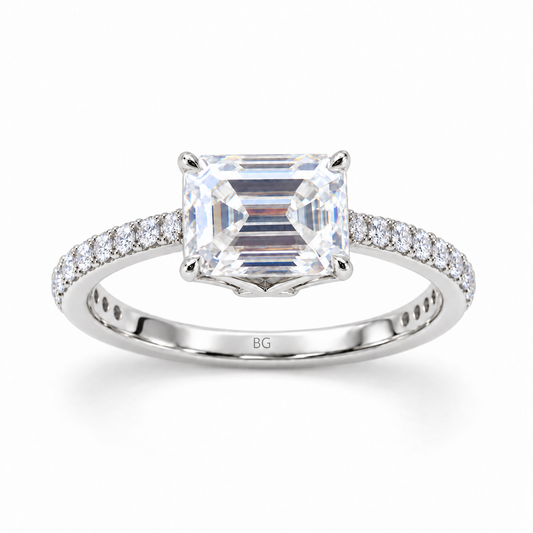 2 CT east-west emerald cut moissanite engagement ring with pave band in white gold