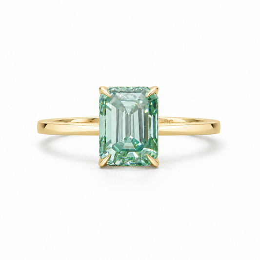 2 CT light green emerald cut moissanite solitaire ring in yellow gold