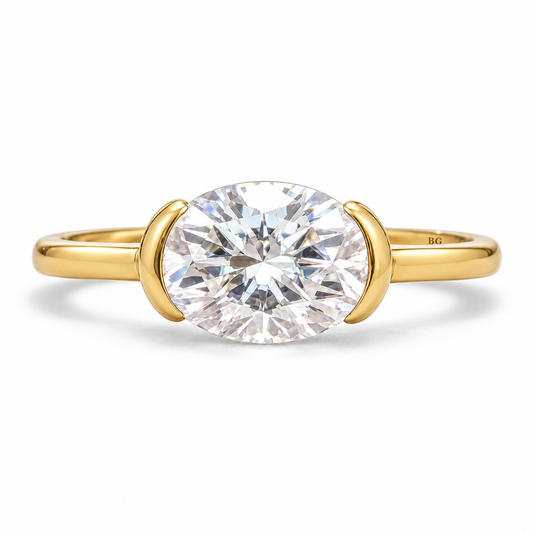2 CT east-west oval moissanite half bezel engagement ring in yellow gold