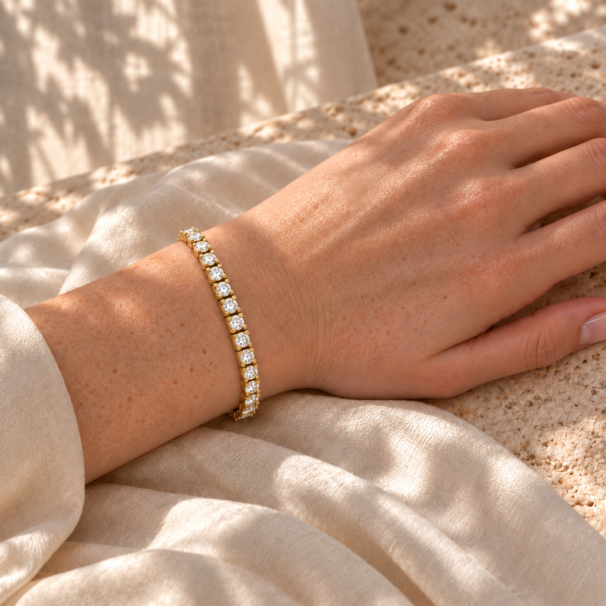 Round moissanite tennis bracelet worn on the wrist