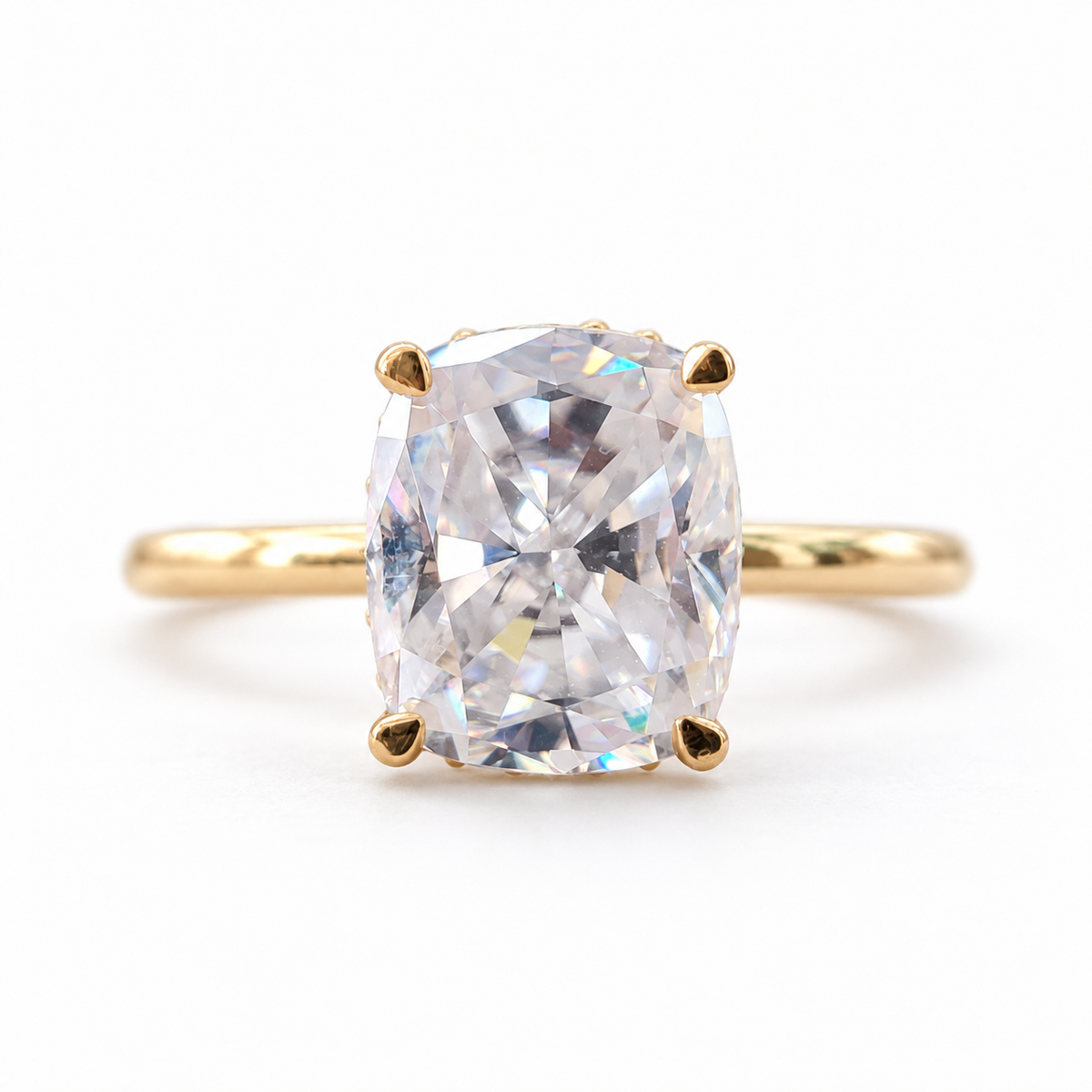 Elongated cushion moissanite hidden halo engagement ring in yellow gold
