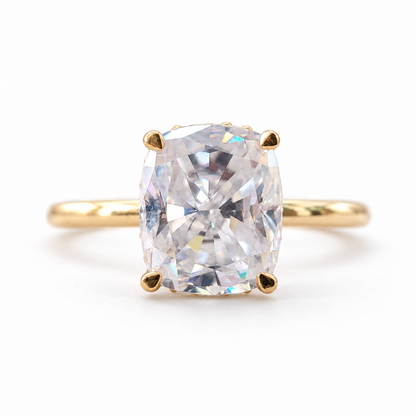 Elongated cushion moissanite hidden halo engagement ring in yellow gold