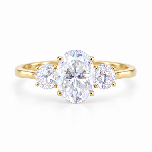 3 CT oval and round moissanite three stone engagement ring in yellow gold