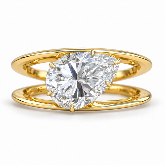 3 CT east-west pear moissanite engagement ring with open split shank in yellow gold