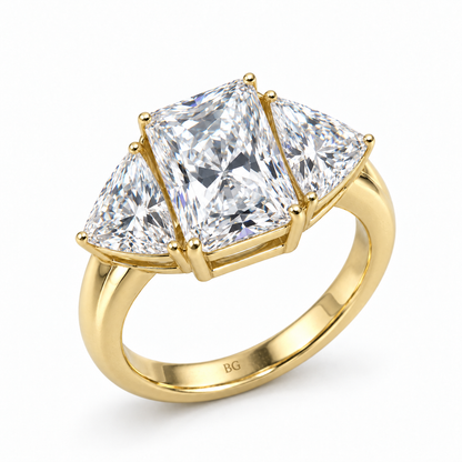 3 CT radiant and trillion cut moissanite three stone engagement ring in yellow gold