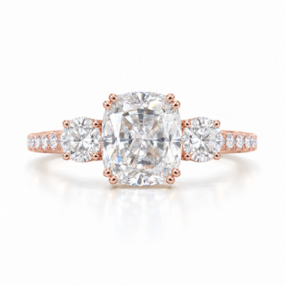 Elongated cushion moissanite three stone engagement ring in rose gold