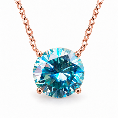 4 CT round blue moissanite solitaire pendant on a rose gold chain