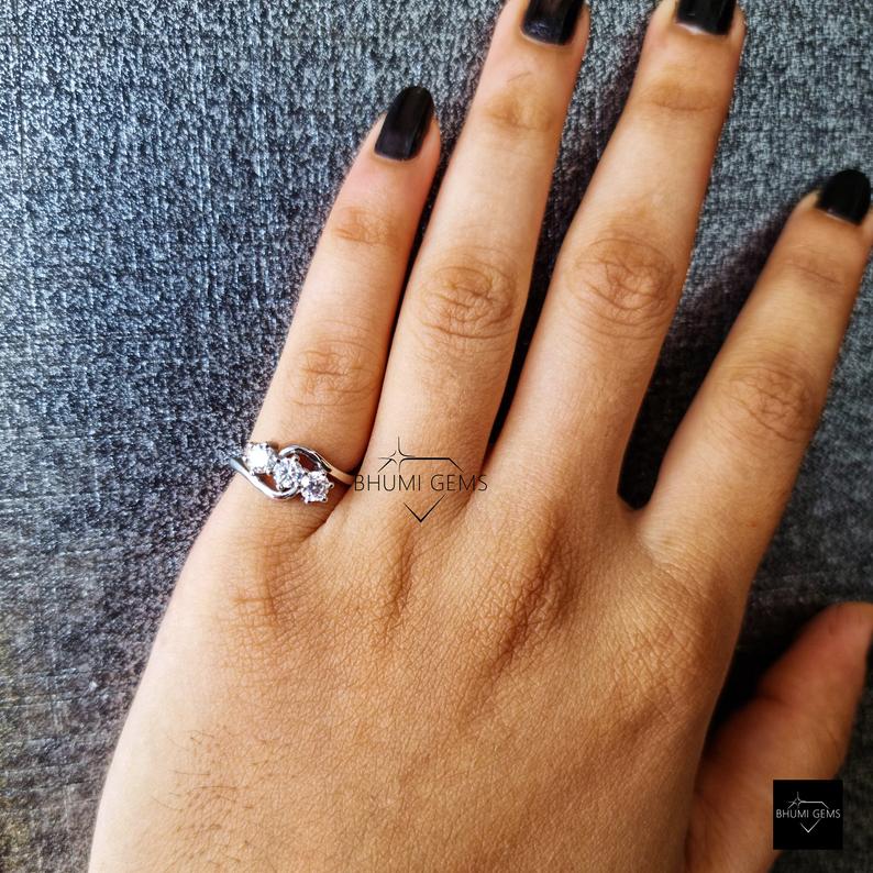 4mm Round Moissanite Three Stone Engagement Ring - view 3