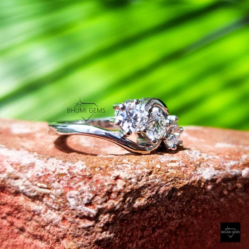 4mm Round Moissanite Three Stone Engagement Ring - view 2