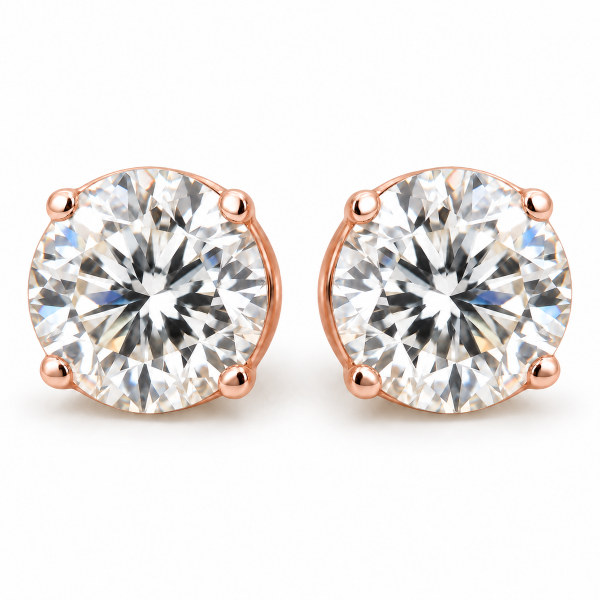 4 TCW round moissanite four prong stud earrings in rose gold