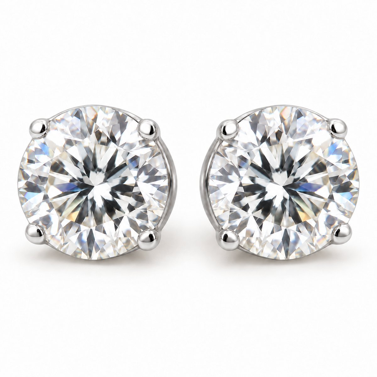 4 TCW round moissanite four prong stud earrings in white gold