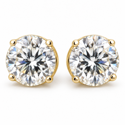4 TCW round moissanite four prong stud earrings in yellow gold