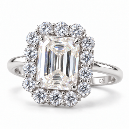 Emerald cut moissanite halo engagement ring with round halo stones in white gold