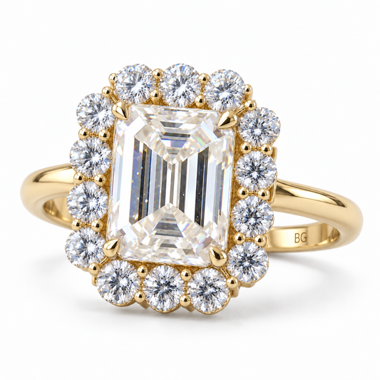 Emerald cut moissanite halo engagement ring with round halo stones in yellow gold