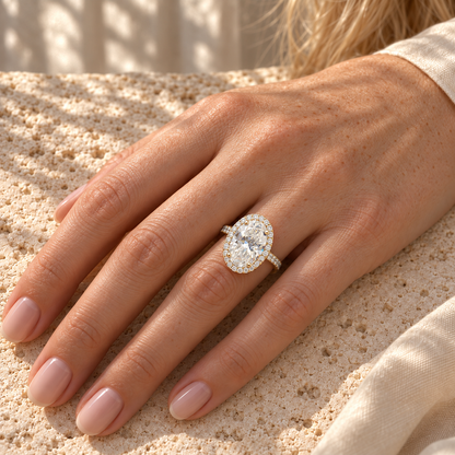 6 CT Oval Cut Colorless Moissanite Engagement Ring - Halo - Yellow gold - worn on the hand