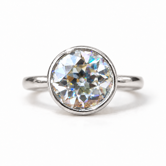 9 MM Old European cut moissanite bezel set ring in white gold