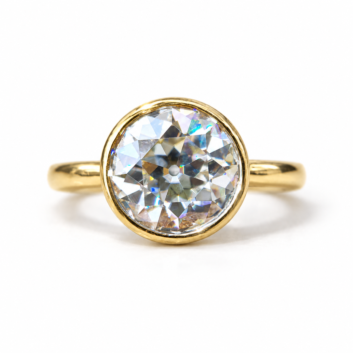 9 MM Old European cut moissanite bezel set ring in yellow gold