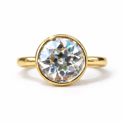 9 MM Old European cut moissanite bezel set ring in yellow gold