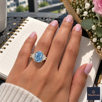 Blue Elongated Cushion Cut Lab Grown Diamond Engagement Ring - Half Moon Split Shank in yellow gold, worn on the hand