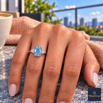 Blue Elongated Cushion Cut Lab Grown Diamond Engagement Ring - Trillion Three Stone in white gold, on the hand