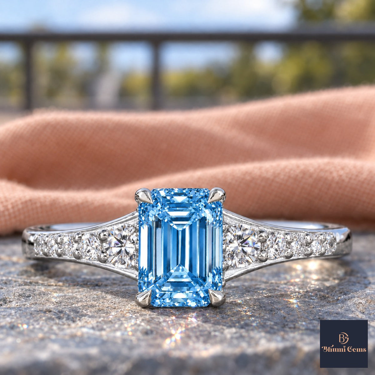Blue Emerald Cut Lab Grown Diamond Engagement Ring - Graduated Pave Shoulders in white gold, close-up