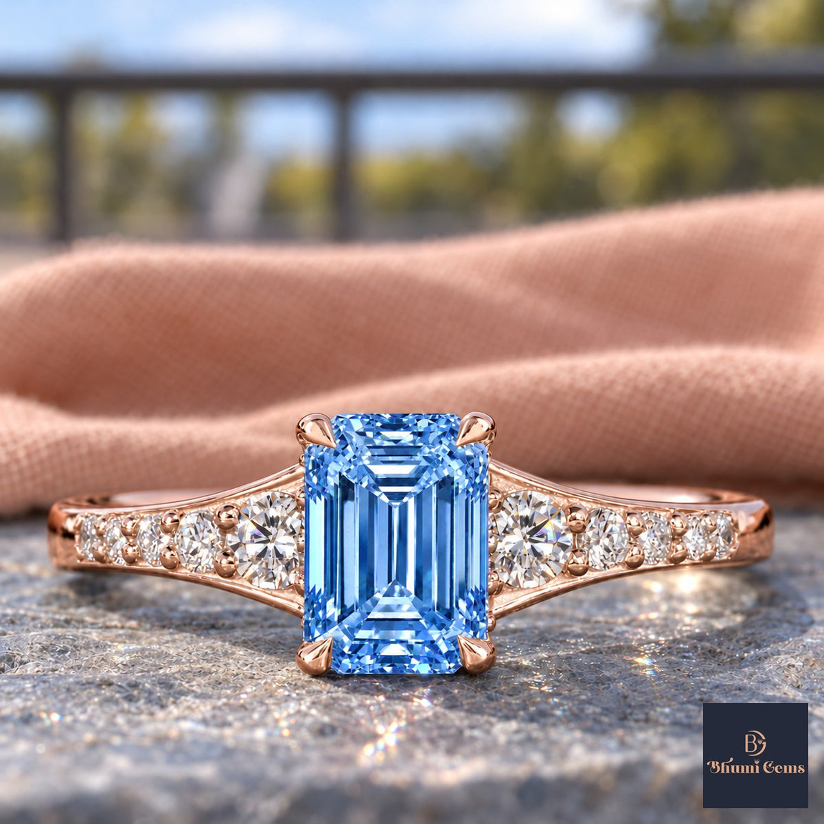Blue Emerald Cut Lab Grown Diamond Engagement Ring - Graduated Pave Shoulders in rose gold, close-up