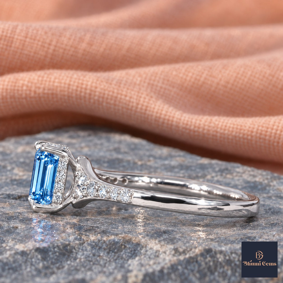 Blue Emerald Cut Lab Grown Diamond Engagement Ring - Graduated Pave Shoulders in white gold, side view