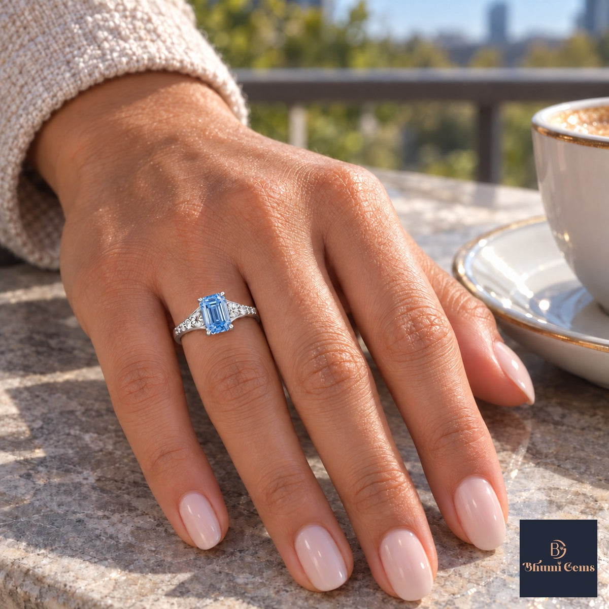 Blue Emerald Cut Lab Grown Diamond Engagement Ring - Graduated Pave Shoulders in white gold, on the hand