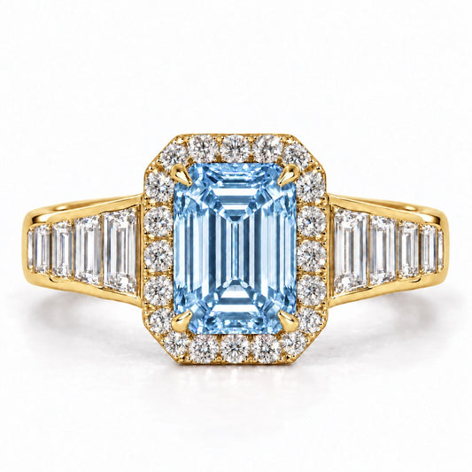 Blue Emerald Cut Lab Grown Diamond Engagement Ring - Halo and Baguette Shoulders in yellow gold, front view