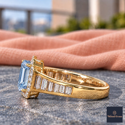 Blue Emerald Cut Lab Grown Diamond Engagement Ring - Halo and Baguette Shoulders in yellow gold, side view