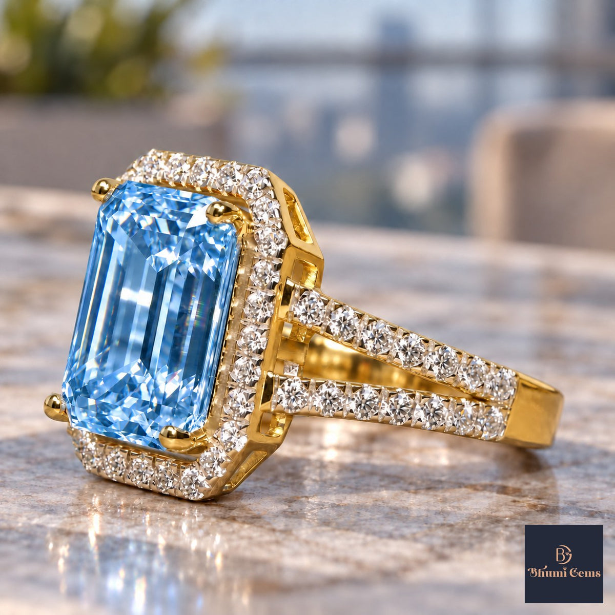 Blue Emerald Cut Lab Grown Diamond Engagement Ring - Halo Split Shank in yellow gold, close-up