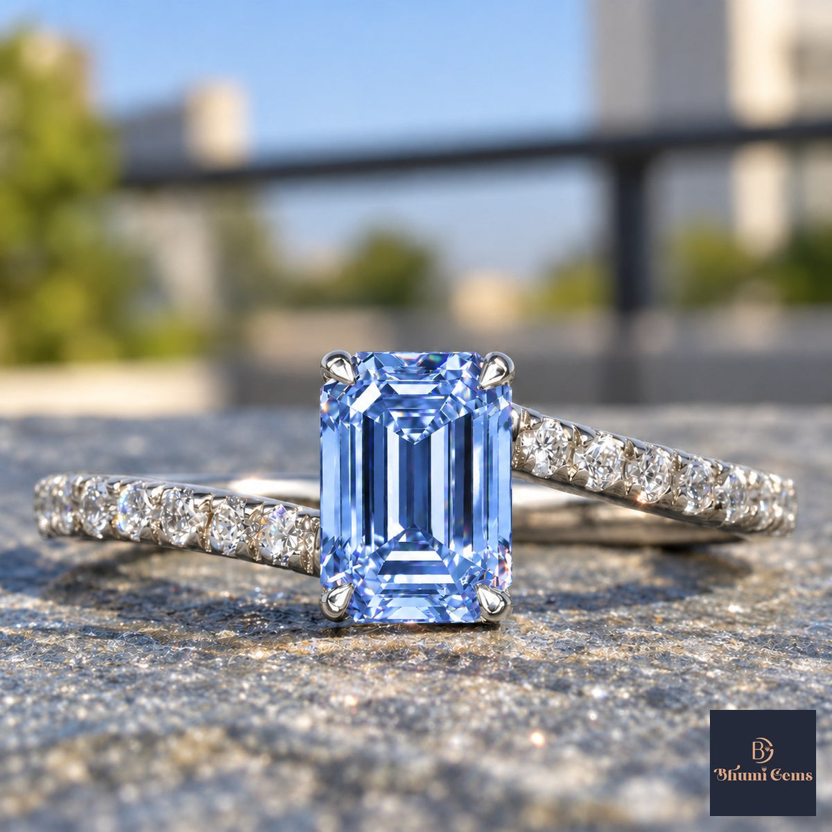 Blue Emerald Cut Lab Grown Diamond Engagement Ring - Pave Band in white gold, close-up